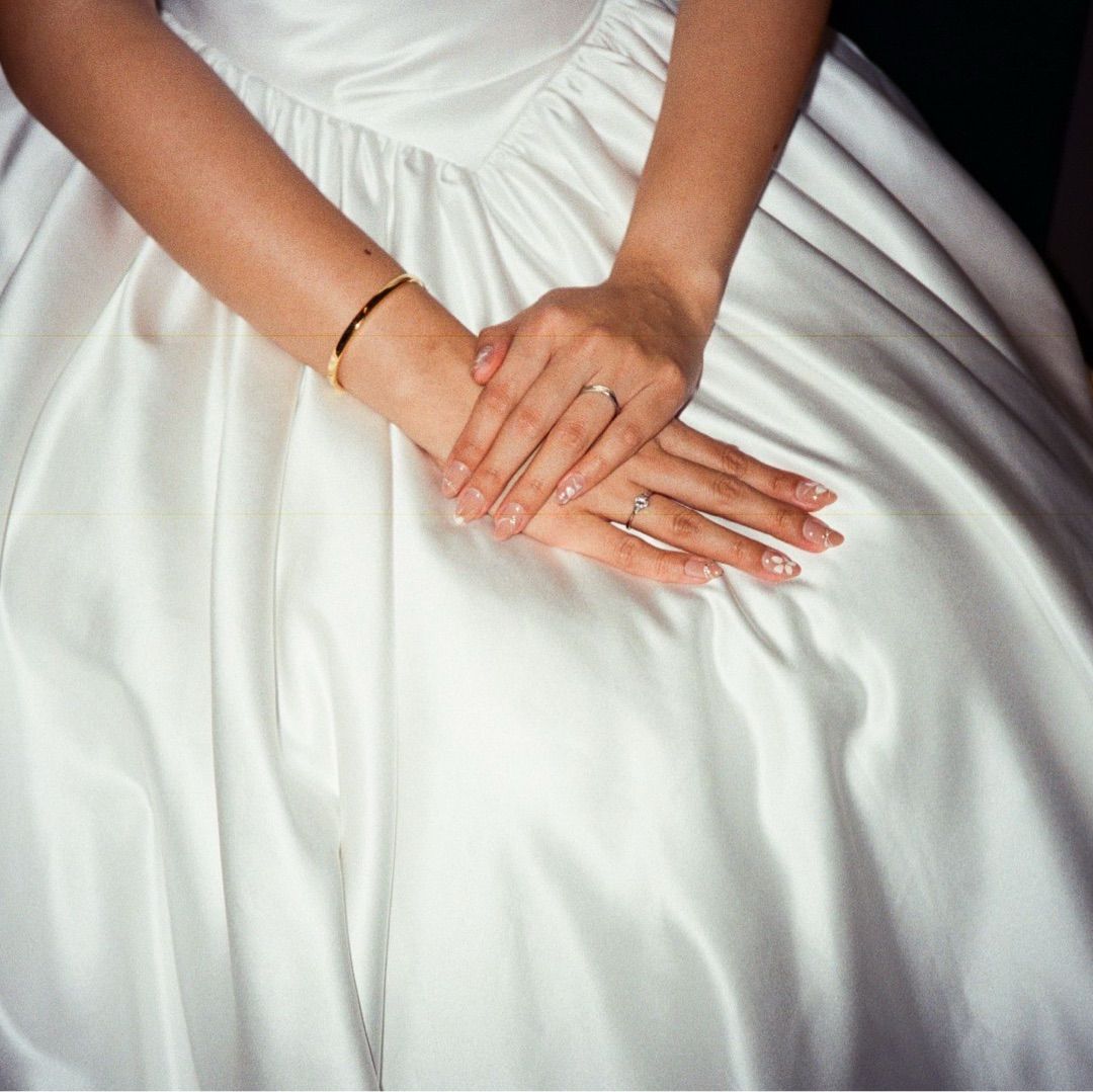 Bride's hands with soft bridal nails