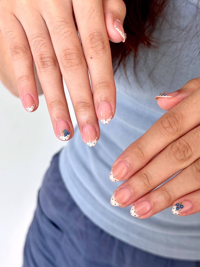 Pink almond nails with tiny line art