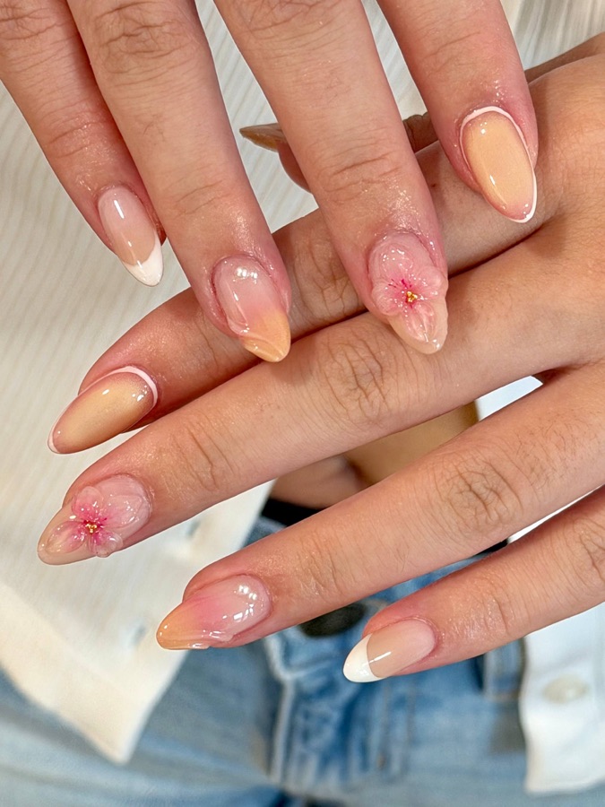 Peach nails with fine floral line art